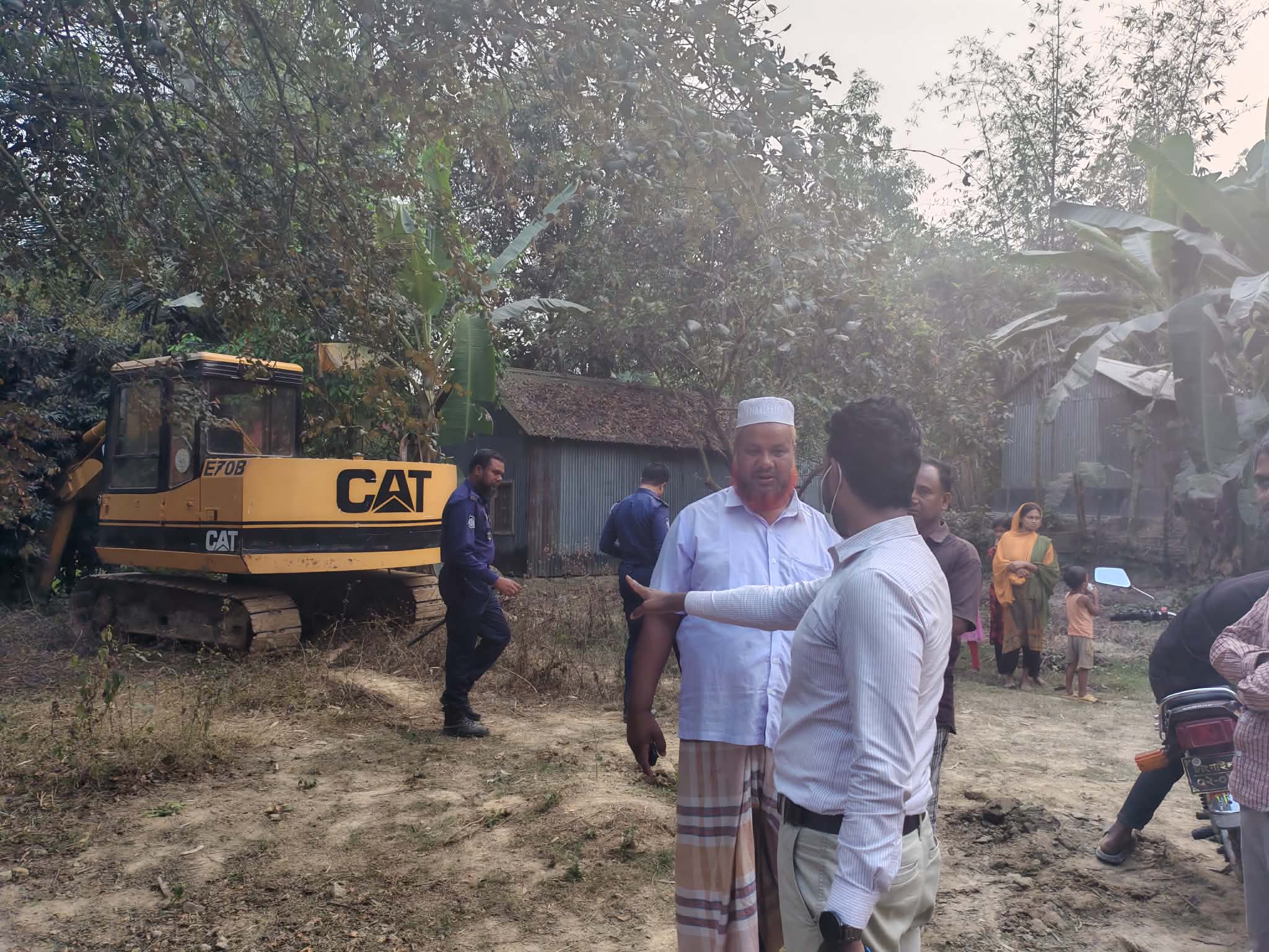 বাসাইলে অবৈধভাবে মাটি কাটায় দেড় লাখ টাকা জরিমানা।